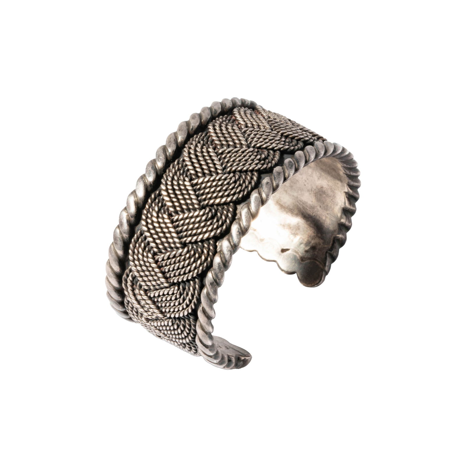 Hector Aguilar Sterling Silver Braided Cuff: including one cuff measuring 5-1/2 inches long by 32.45mm wide, and weighing 111.4 grams Provenance: The Estate of Antiquarian and Collector Ron Belkin, Long Beach, CA. A revered figure in the art and