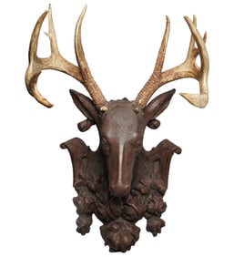 A Painted Terracotta Deer Head-Form Wall Mount
