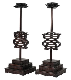 A Pair of Chinese Carved Wood Candle Stands