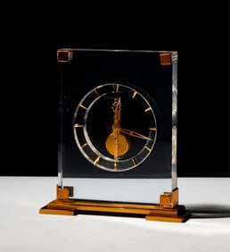 A Jaeger LeCoultre Brass and Lucite Desk Clock