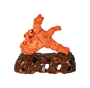A Chinese Carved Coral Guan Yin Figure