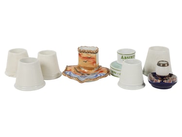 A Group of Eight Vintage Ceramic Match Strikes