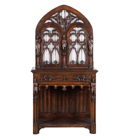 A Gothic-Style Carved Oak Cabinet
