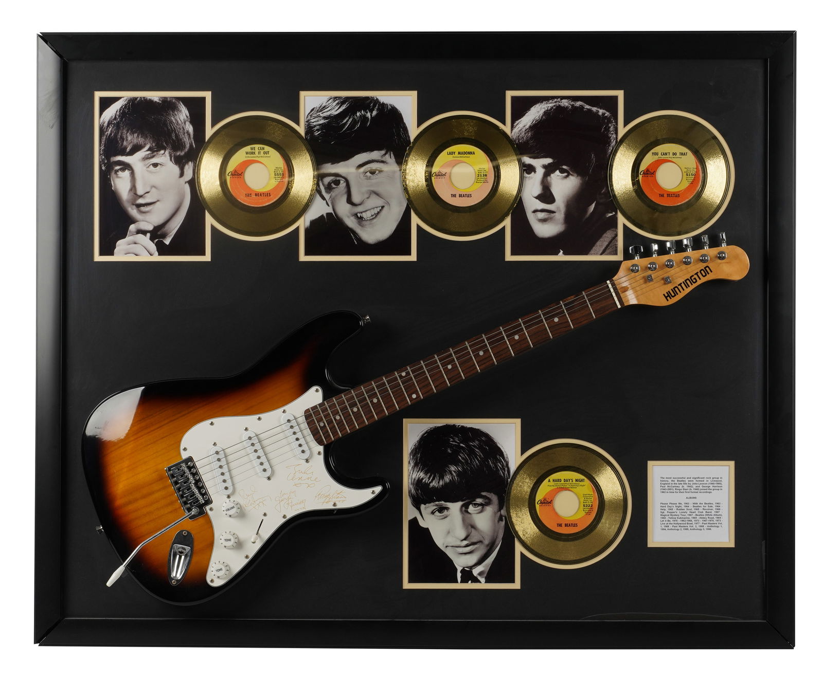 A Beatles Tribute Framed Display: the guitar with signatures (not authenticated) Frame: 35 x 43 in. (88.9 x 109.2 cm.)