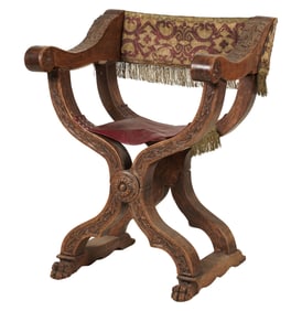 An Italian Carved Walnut Savonarola Chair