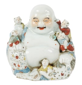 A Chinese Porcelain Laughing Buddha or Hotei Figure