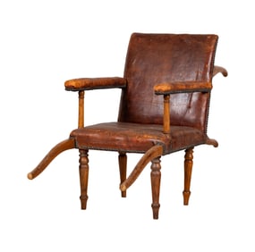 An Antique Leather Valet Chair
