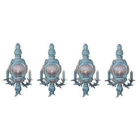 A Set of Four Large French Cast Iron Sconces