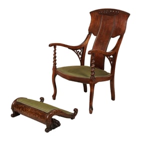 A Victorian Armchair with Upholstered Footstool