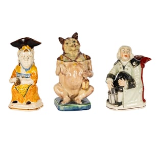 A Group of Pottery Figural Vessels