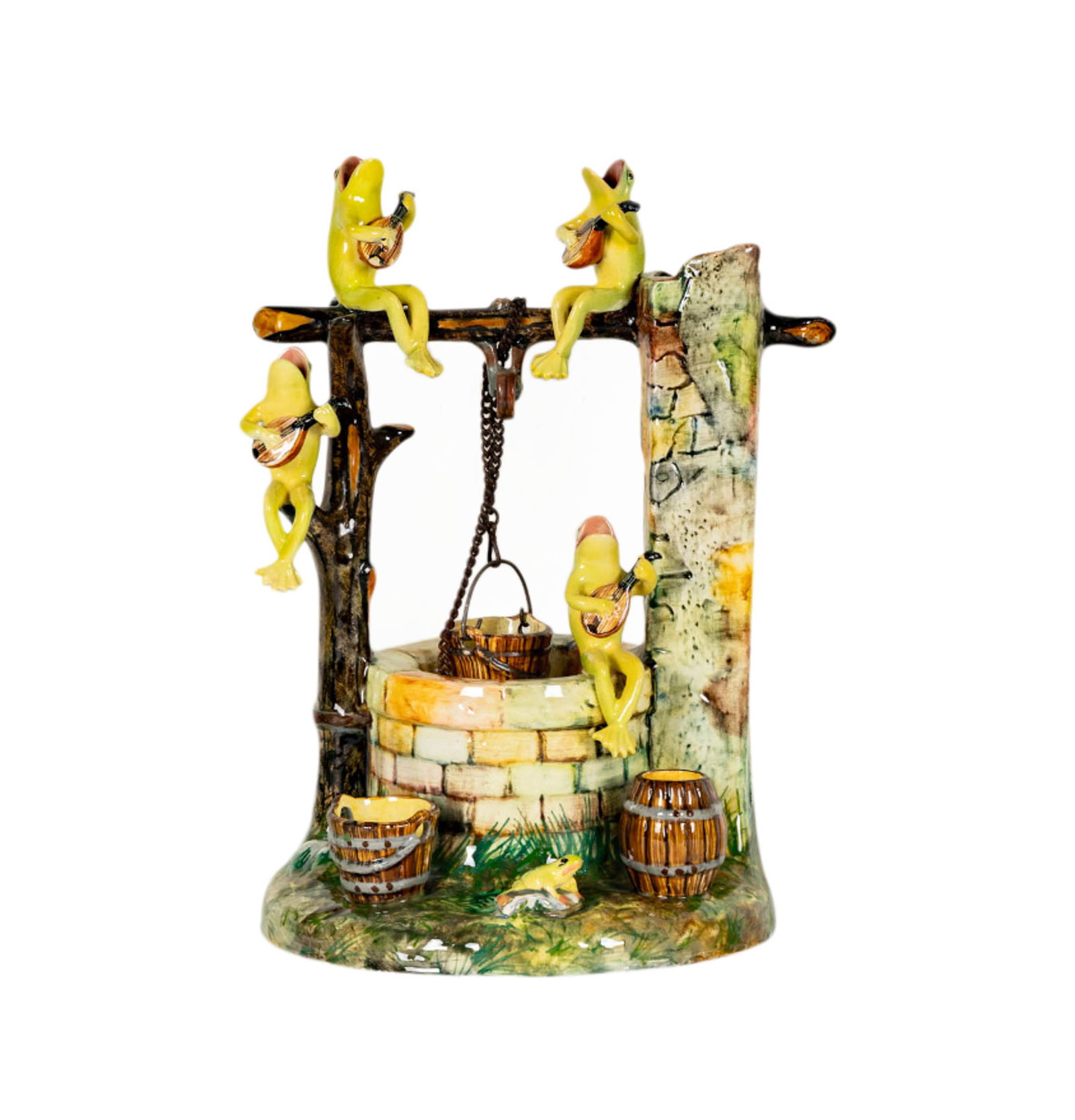 A Jerome Massier Majolica Model of Frogs at a Well: c. 1900; modeled as four frogs playing lutes, seated on and above a well between a ruined arch and a tree trunk, with a bucket suspended from a branch; impressed to underside ?Jerome Massier / Vallaur