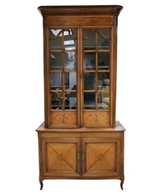 A French Provincial Inlaid Oak Cabinet