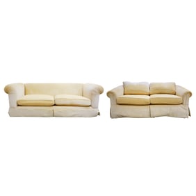 A Yellow Upholstered Sofa and Loveseat