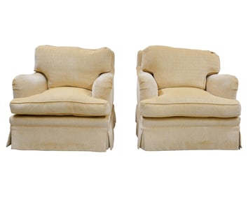 A Pair of Yellow Upholstered Club Chairs