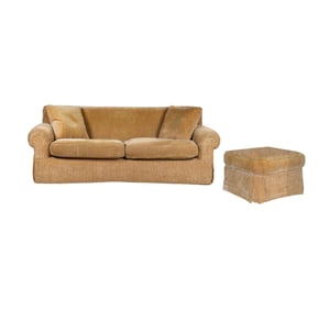 An Upholstered Sofa and Ottoman