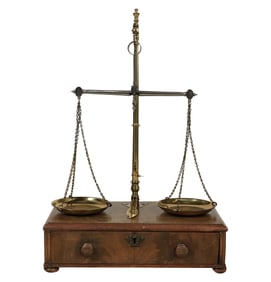 An Antique Brass and Wood Balance Scale