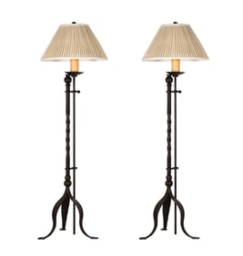 A Pair of Patinated Metal Torchiere Floor Lamps