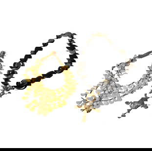 Two Stone Necklaces: one grey stone necklace measuring 24 inches long by 1-3/8 inches wide, and with metal pendant measuring 4-3/4 inches tall by 3 inches wide; and one green quartz necklace measuring 15-3/4 inches long