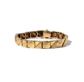 One 14 Karat Yellow Gold Bracelet