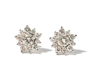 A Pair of 18 Karat White Gold, Diamond Floral Earrings