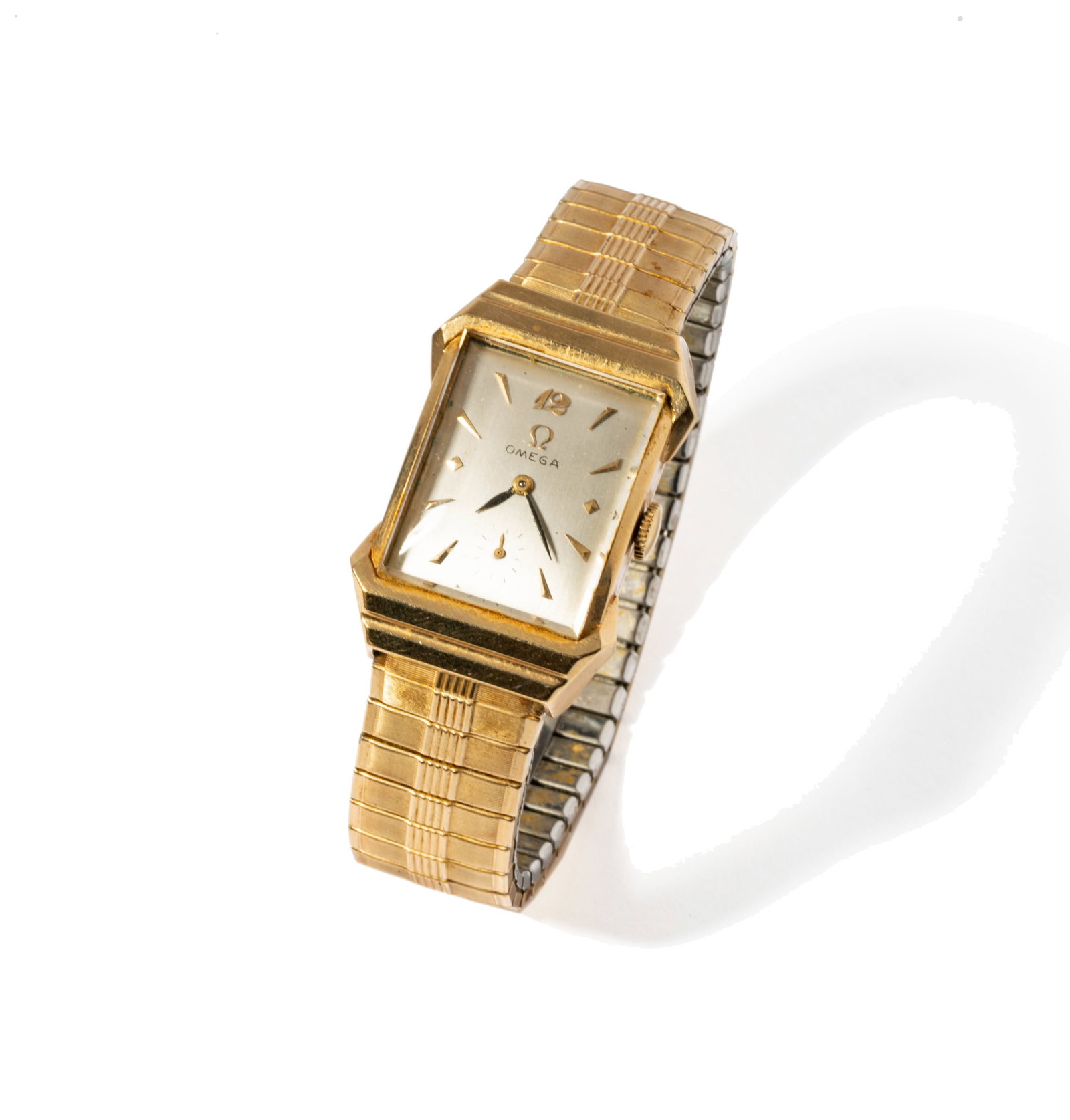 Omega 14 Karat and Stainless Steel Men's Watch: case back engraved to Dr. Theo J. Curphey, case measuring 35.60x21.60mm; bracelet measuring 6-3/8 inches inside, weighing 50.9 grams; Dr. Theo.J.Curphey was the chief coroner during the investigation 