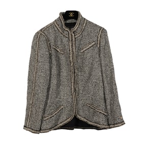 A Chanel Black, White, and Gold Tweed Jacket