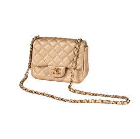 A Chanel Patent Leather Quilted Mini Flap Bag