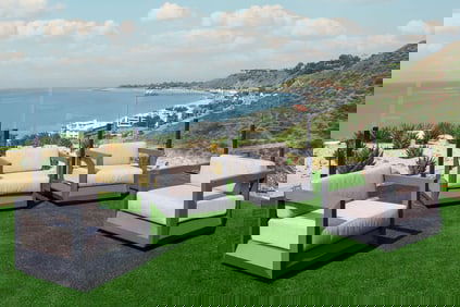 A Set of Four Restoration Hardware Paloma Patio Swivel Lounge Chairs