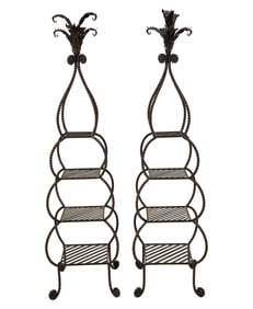 A Pair of Iron Patinated Metal Stands
