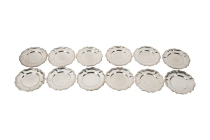 A Set of Twelve Peruvian .900 Silver Plates
