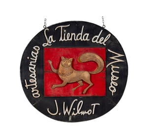 A Mexican Painted Metal and Wood Sign