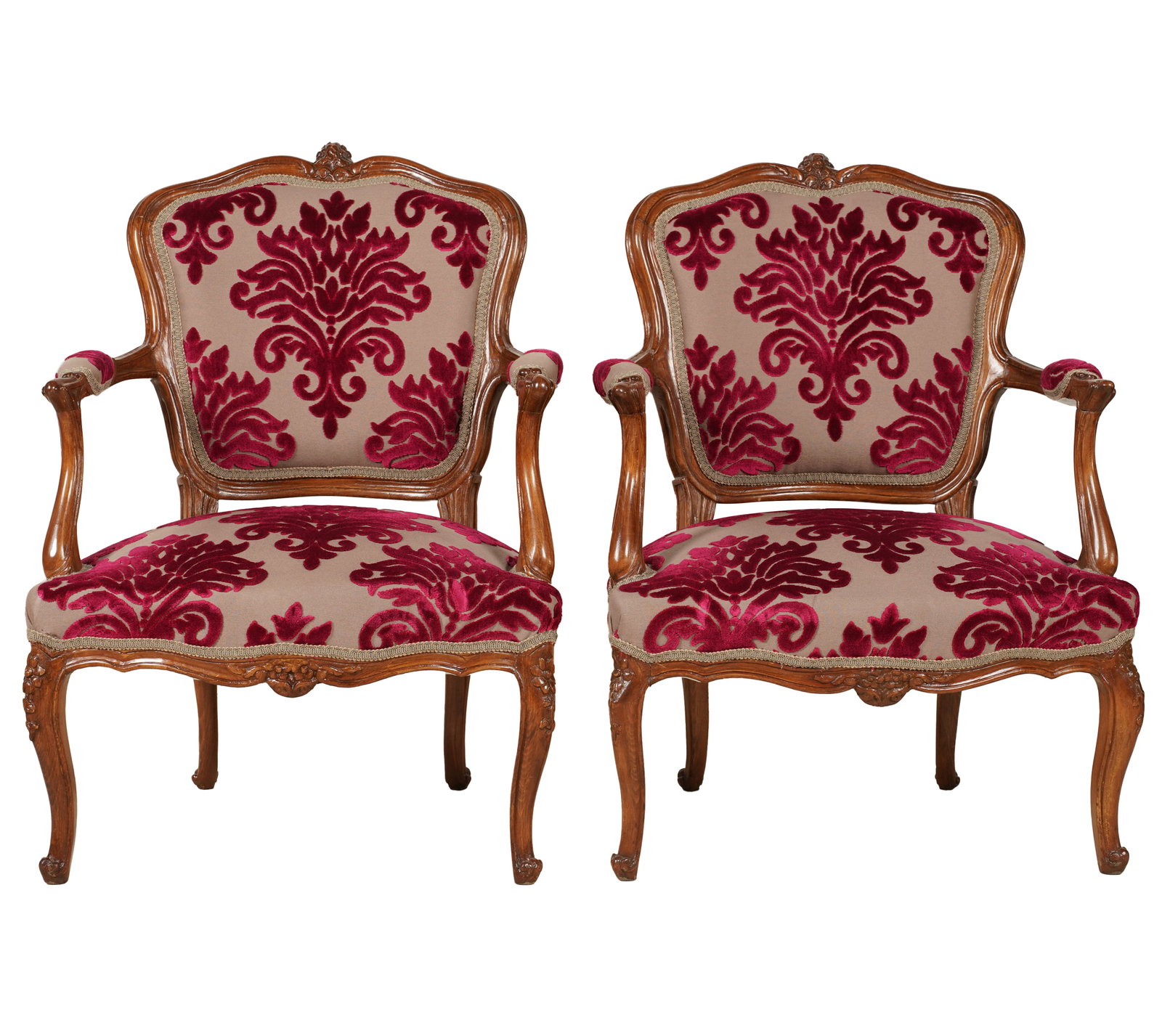 A Pair of Louis XV-Style Fauteuils: covered with fuchsia and lilac fabric 33 1/2 x 24 1/2 x 23 in. (85.1 x 62.2 x 58.4 cm.) Seat height: 15 in. (38.1 cm.)