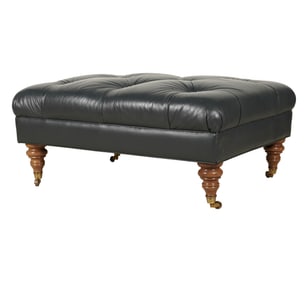 A Tufted Leather Ottoman