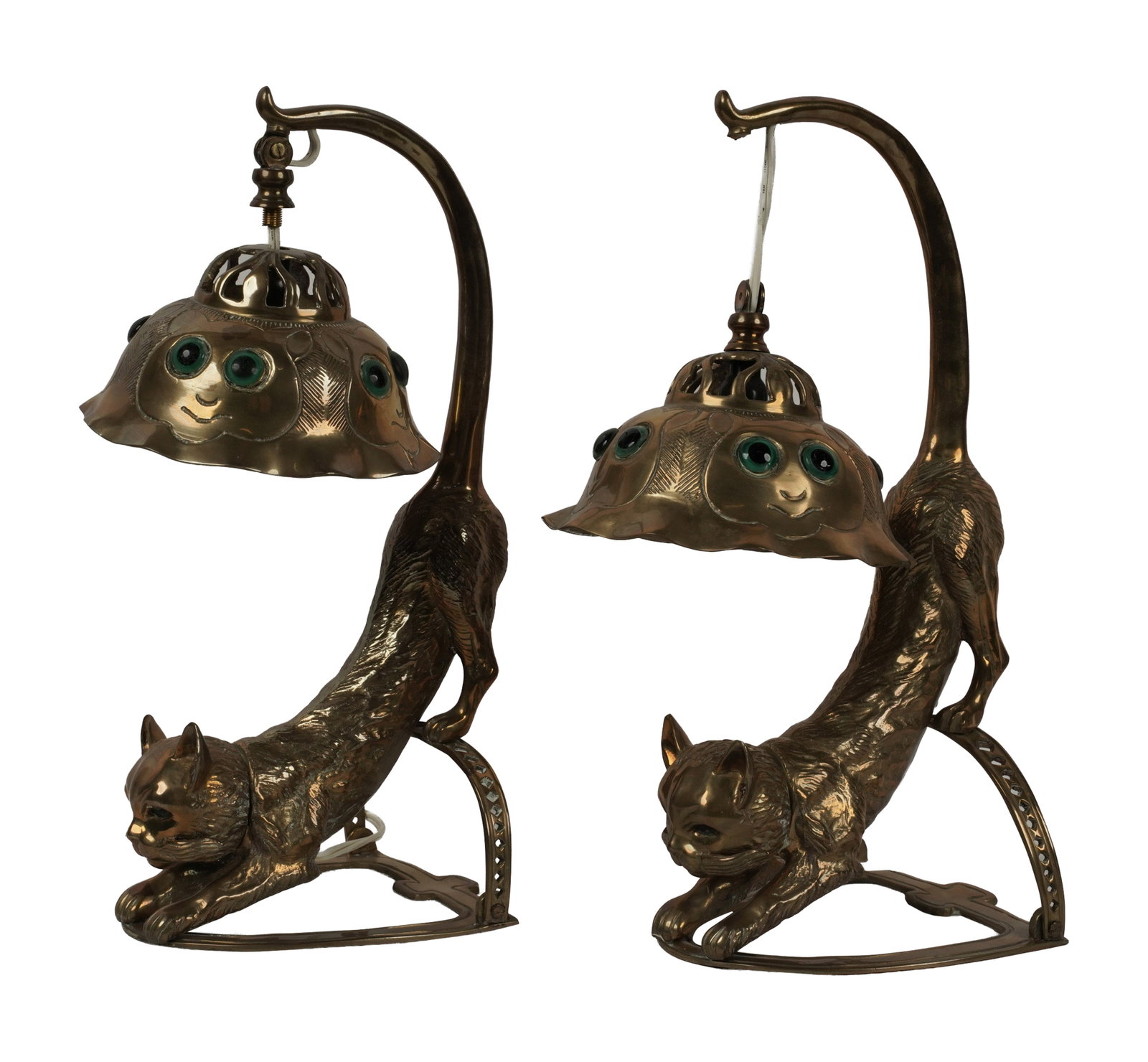 A Pair of Brass Cat-Form Table Lamps: each with inset glass eyes; unsigned Each: 16 x 8 x 8 in. (40.6 x 20.3 x 20.3 cm.)
