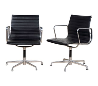 A Pair of Chrome and Leather Office Chairs