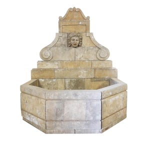 An Italian Neoclassical Carved Limestone Fountain