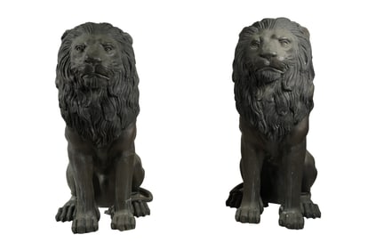 A Pair of Large Patinated Bronze Lions