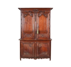 A French Provincial Carved Oak Buffet a Deux Corps