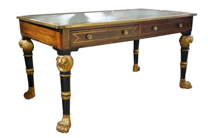 An English Regency Gilt and Ebonized Mahogany Library Table