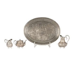 A Persian Silver Repousse Tea Service
