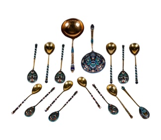 A Group of 16 Russian Silver Gilt and Cloisonne Enamel Spoons
