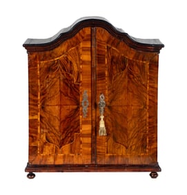 A Continental Fruitwood and Walnut Diminutive Cabinet