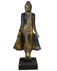 A Monumental Carved Giltwood Figure of Buddha