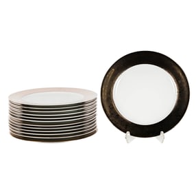 A Set of 12 Philippe Deshoulierres Porcelain Chargers