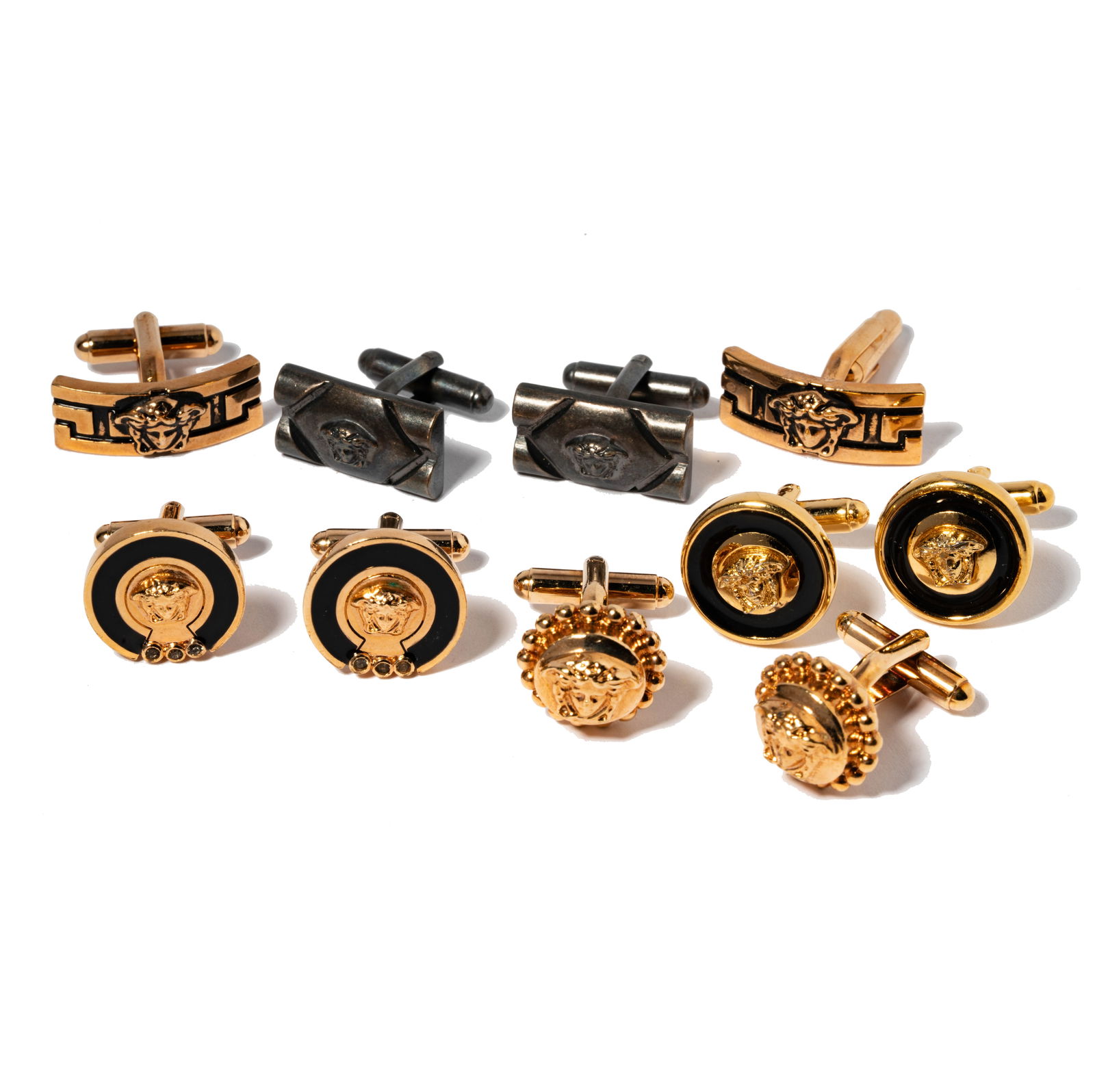 Versace Five Pairs of Costume Cufflinks: Including five pairs of Versace gold-tone cufflinks;