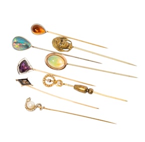 A Group of Eight Stick Pins