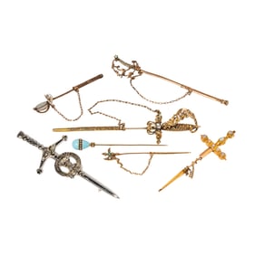 Collection of Seven Gold Sword Stick Pins