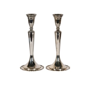 A Pair of Sterling Candlesticks