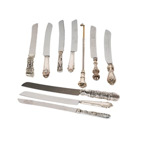 A Group of SIlver and Silverplate Knives