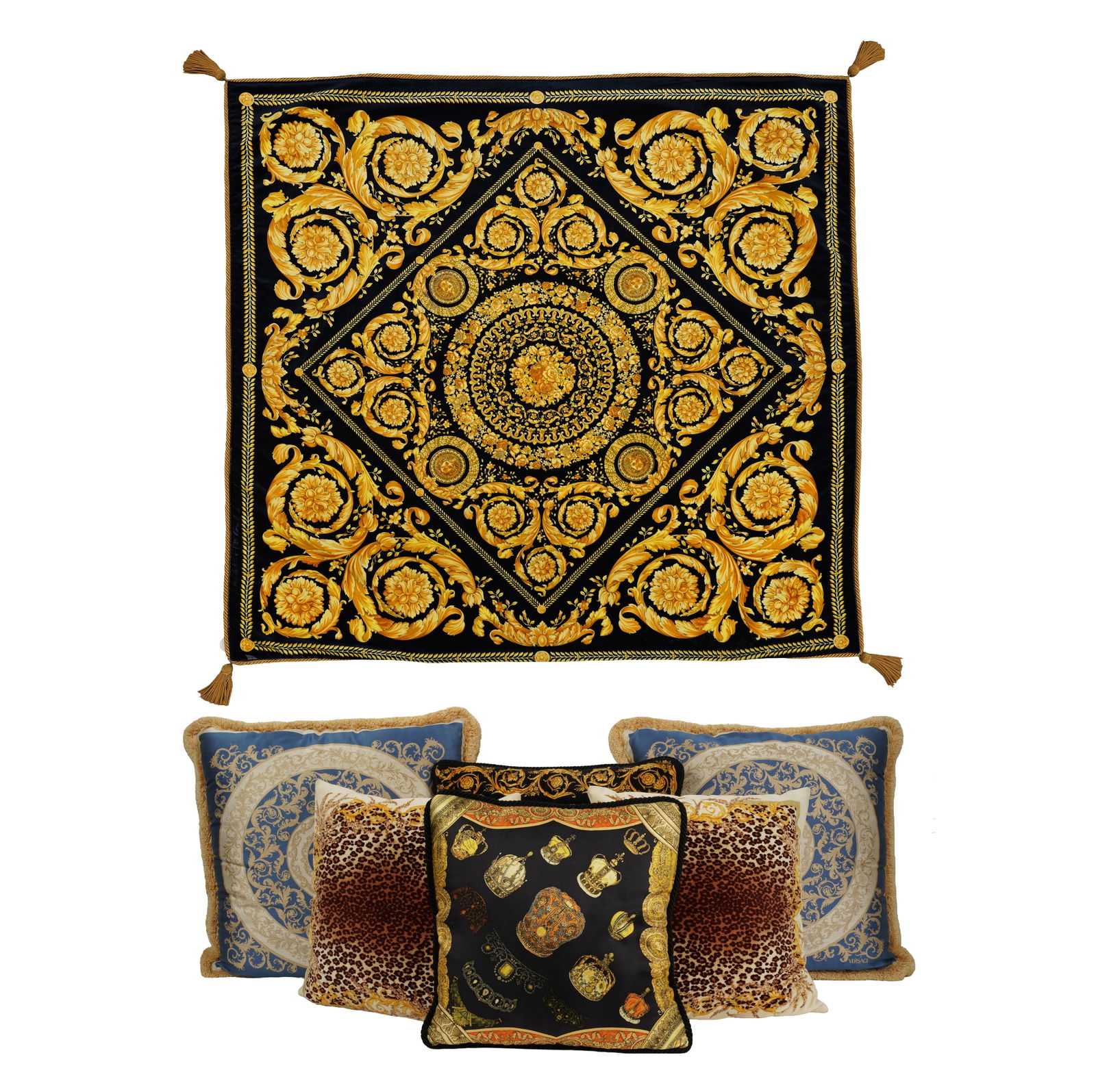 A Group of Designer Pillows and a Blanket: comprising six assorted pillows, each pillow with Versace printed logo, one with Versace label to interior (Two 19 x 19 in.) and one Versace-style throw blanket with "Made in Italy" label, 52 x 50 in.